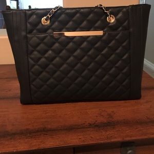 Black purse w/gold details & leopard print lining